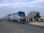 AMTK 164    6Mar2010  NB Train 22 (Texas Eagle) Passing the old AmTrak station  